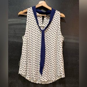 Anthropologie white sleeveless blue floral, print V neck, blue tie collar